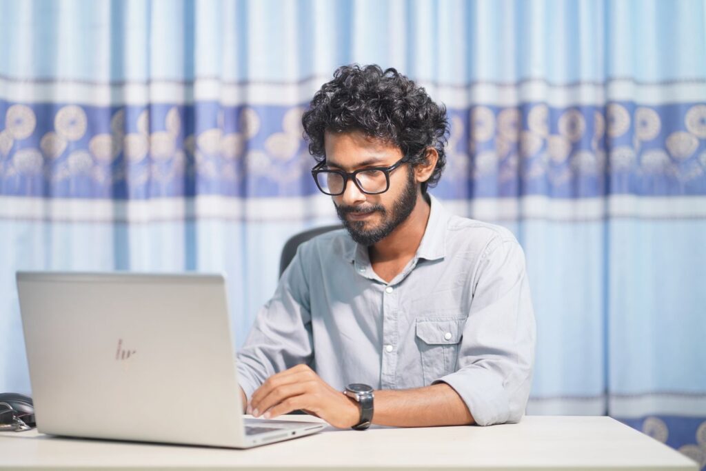 Developer building an online store on a laptop