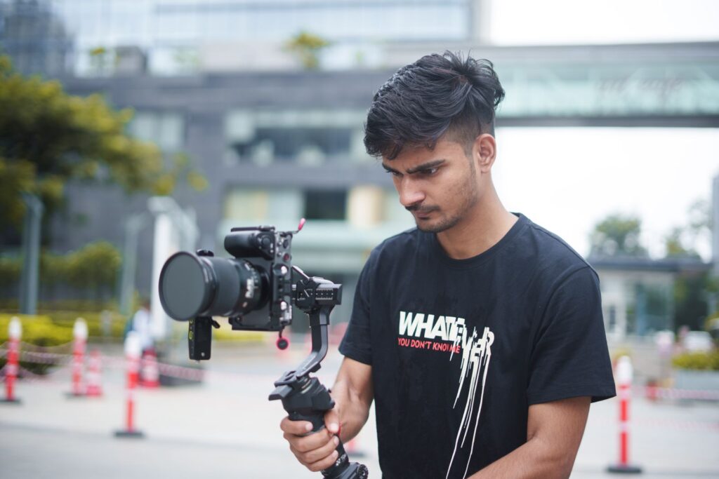 Content creator filming a brand video with a camera gimbal